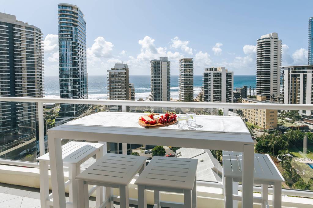Balcony dining above the coast