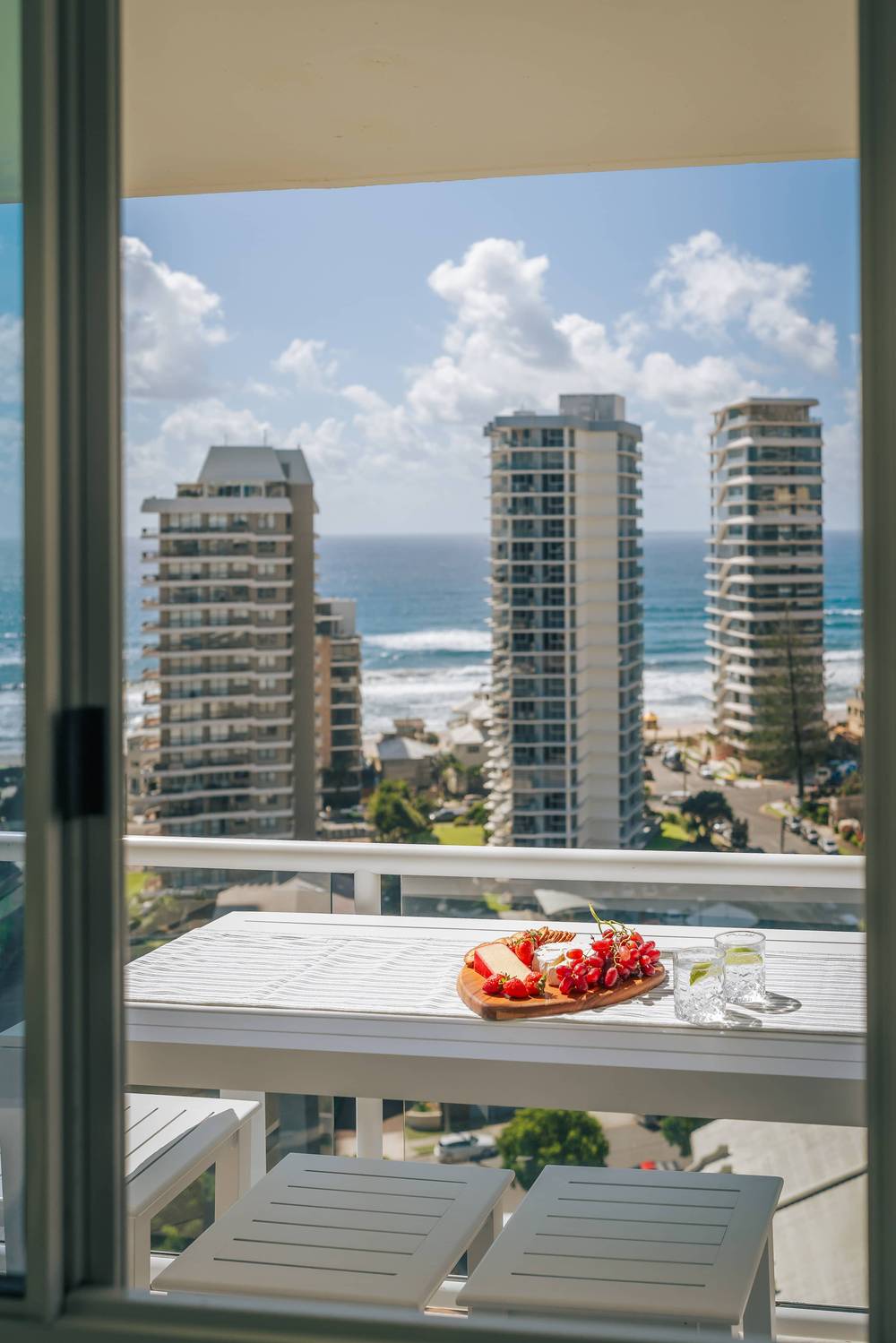 Balcony with cheese board and drinks