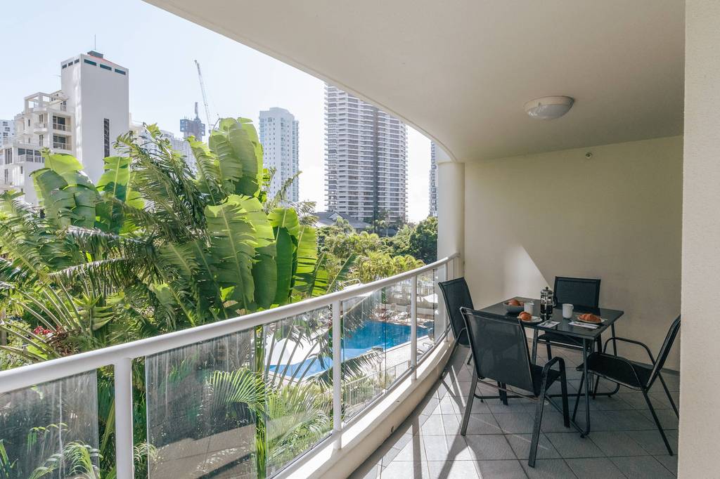 Balcony overlooking pool and hinterland