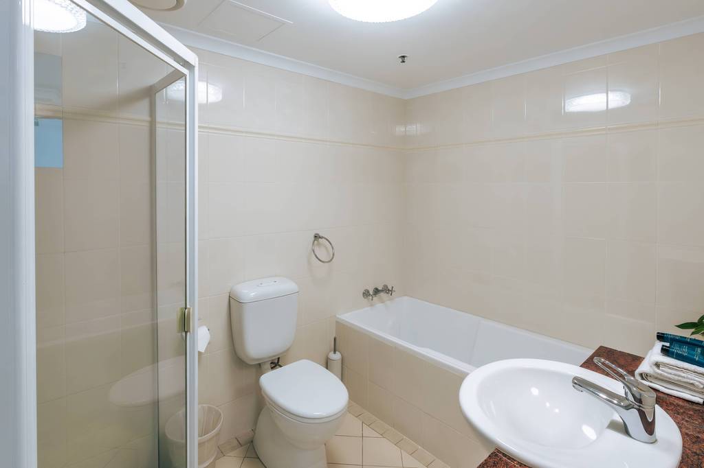 Bathroom with walk-in shower and bathtub